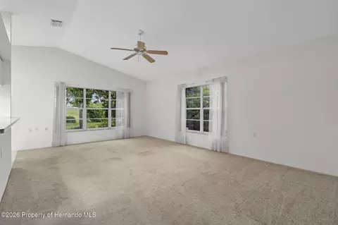 Living - 3072 Eagle Bend Rd, Spring Hill, FL 34606 photo 6 of 8