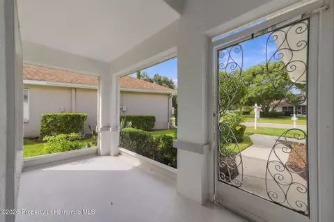 Exterior - 14458 Tamarind Loop, Spring Hill, FL 34609 photo 5 of 12