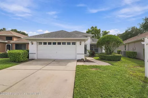 Exterior - 14458 Tamarind Loop, Spring Hill, FL 34609 photo 2 of 12