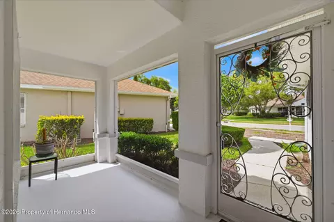 Exterior - 14458 Tamarind Loop, Spring Hill, FL 34609 photo 8 of 10