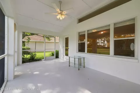 Exterior - 14458 Tamarind Loop, Spring Hill, FL 34609 photo 7 of 12