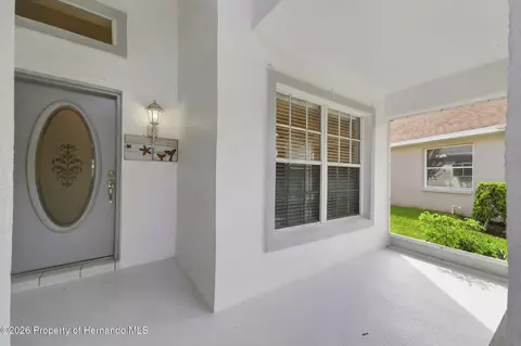 Exterior - 14458 Tamarind Loop, Spring Hill, FL 34609 photo 4 of 12