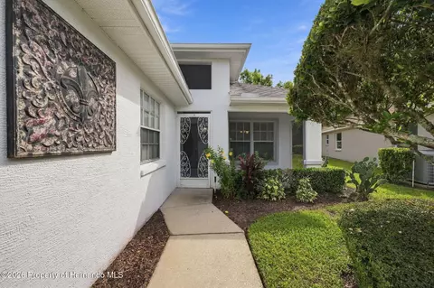 Exterior - 14458 Tamarind Loop, Spring Hill, FL 34609 photo 3 of 12