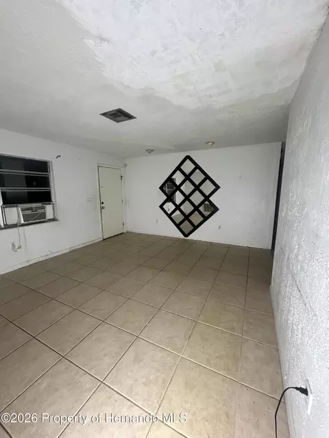 Living - 1277 Piper Rd, Spring Hill, FL 34606 photo 4 of 7