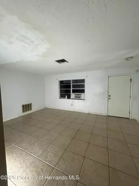 Living - 1277 Piper Rd, Spring Hill, FL 34606 photo 3 of 7