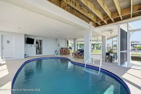 Exterior - 3420 Eagle Nest Dr, Hernando Beach, FL 34607 photo 5 of 16