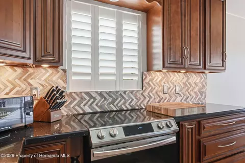 Kitchen - 3420 Eagle Nest Dr, Hernando Beach, FL 34607 photo 5 of 7