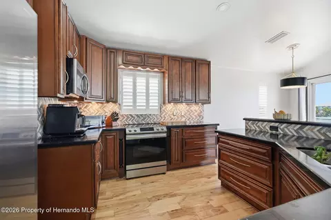 Kitchen - 3420 Eagle Nest Dr, Hernando Beach, FL 34607 photo 6 of 7