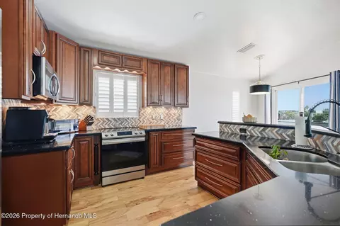 Kitchen - 3420 Eagle Nest Dr, Hernando Beach, FL 34607 photo 1 of 7