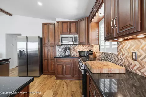 Kitchen - 3420 Eagle Nest Dr, Hernando Beach, FL 34607 photo 2 of 7