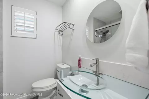 Bath - 3420 Eagle Nest Dr, Hernando Beach, FL 34607 photo 2 of 7