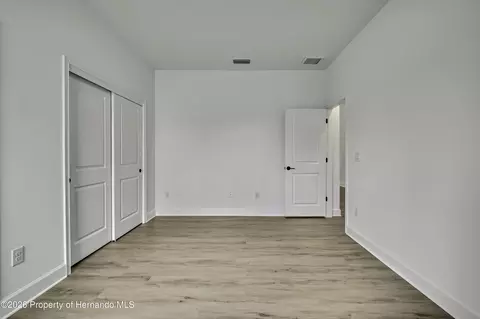 Bedroom - 6589 Freeport Dr, Spring Hill, FL 34608 photo 4 of 11