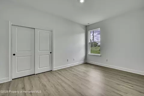 Bedroom - 6589 Freeport Dr, Spring Hill, FL 34608 photo 9 of 11