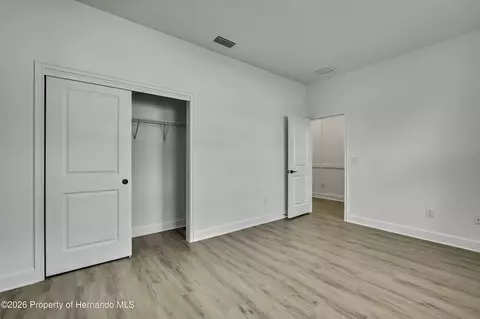 Bedroom - 6589 Freeport Dr, Spring Hill, FL 34608 photo 10 of 11