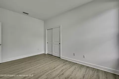 Bedroom - 6589 Freeport Dr, Spring Hill, FL 34608 photo 8 of 11