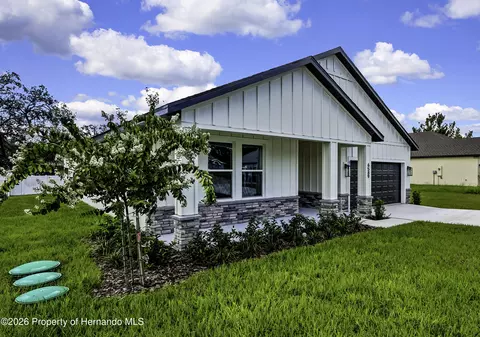 Exterior - 6589 Freeport Dr, Spring Hill, FL 34608 photo 2 of 9