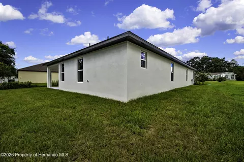 Exterior - 6589 Freeport Dr, Spring Hill, FL 34608 photo 3 of 9