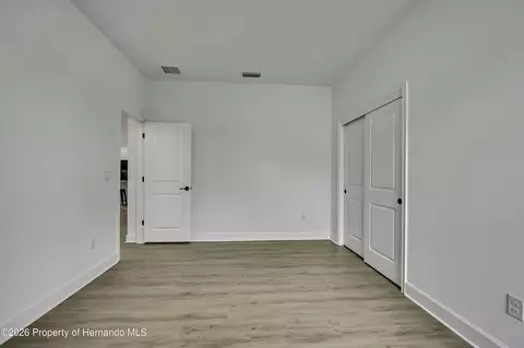 Bedroom - 6589 Freeport Dr, Spring Hill, FL 34608 photo 7 of 11
