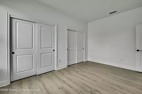 Bedroom - 6589 Freeport Dr, Spring Hill, FL 34608 photo 5 of 11