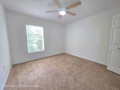 Bedroom - 9055 Pemberton St, Spring Hill, FL 34608 photo 1 of 9