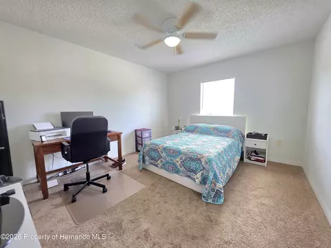 Bedroom - 9055 Pemberton St, Spring Hill, FL 34608 photo 3 of 9