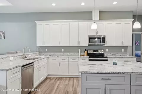 Kitchen - 4743 Jumper Loop, Spring Hill, FL 34609 photo 2 of 15