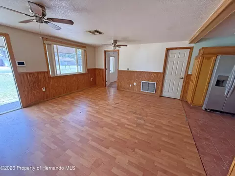 Living - 6134 Pinehurst Dr, Spring Hill, FL 34606 photo 3 of 7