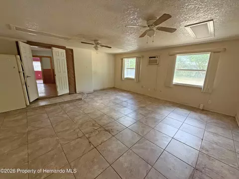 Living - 6134 Pinehurst Dr, Spring Hill, FL 34606 photo 5 of 7