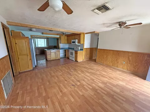 Living - 6134 Pinehurst Dr, Spring Hill, FL 34606 photo 2 of 7