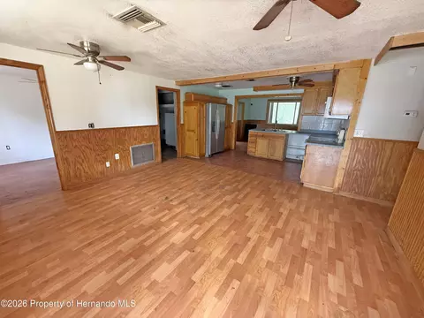 Living - 6134 Pinehurst Dr, Spring Hill, FL 34606 photo 1 of 7