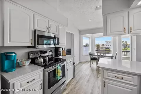 Kitchen - 4168 Orchid Dr, Hernando Beach, FL 34607 photo 4 of 4