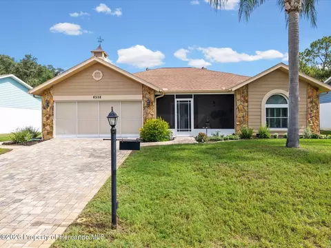 Exterior - 6558 Pine Meadows Dr, Spring Hill, FL 34606 photo 2 of 14
