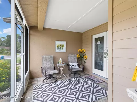 Exterior - 6558 Pine Meadows Dr, Spring Hill, FL 34606 photo 4 of 14