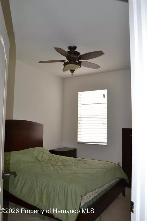 Bedroom - 659 Winthrop Dr, Spring Hill, FL 34609 photo 10 of 11