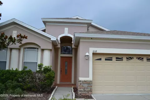 Exterior - 659 Winthrop Dr, Spring Hill, FL 34609 photo 3 of 5