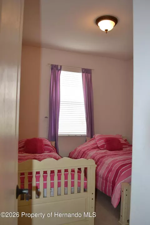 Bedroom - 659 Winthrop Dr, Spring Hill, FL 34609 photo 5 of 11