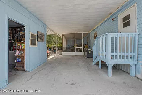 Exterior - 7491 NE 101st Ct, Bronson, FL 32621 photo 4 of 7
