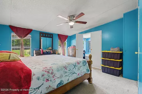 Bedroom - 7491 NE 101st Ct, Bronson, FL 32621 photo 2 of 5