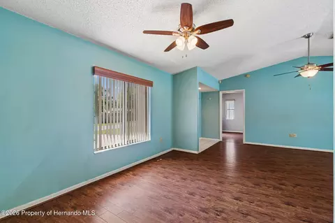 Living - 4235 Castle Ave, Spring Hill, FL 34609 photo 7 of 9