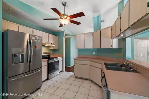 Kitchen - 4235 Castle Ave, Spring Hill, FL 34609 photo 6 of 7