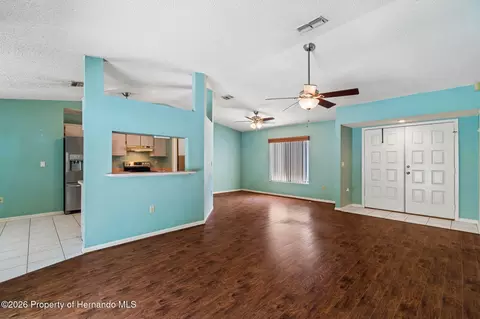 Living - 4235 Castle Ave, Spring Hill, FL 34609 photo 5 of 9