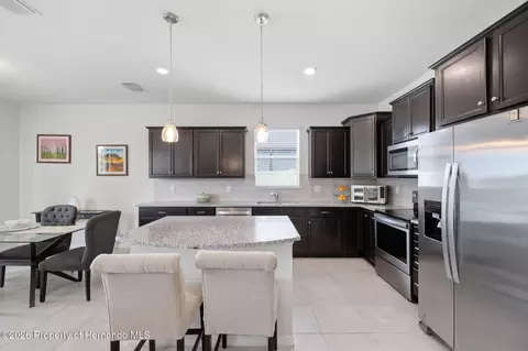 Kitchen - 12929 Palapa Loop, Spring Hill, FL 34610 photo 2 of 3