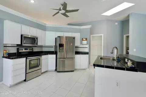 Kitchen - 13808 Rudi Loop, Spring Hill, FL 34609 photo 2 of 2