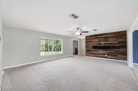 Living - 459 Savoy Ct, Spring Hill, FL 34606 photo 2 of 9