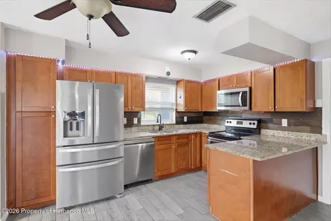 Kitchen - 459 Savoy Ct, Spring Hill, FL 34606 photo 3 of 4