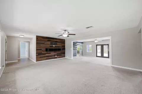 Living - 459 Savoy Ct, Spring Hill, FL 34606 photo 7 of 9