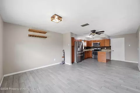 Living - 459 Savoy Ct, Spring Hill, FL 34606 photo 5 of 9