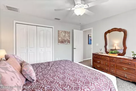 Bedroom - 3454 St Ives Blvd, Spring Hill, FL 34609 photo 5 of 7