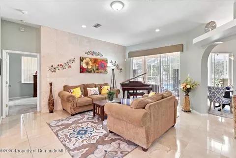 Living - 3454 St Ives Blvd, Spring Hill, FL 34609 photo 1 of 6