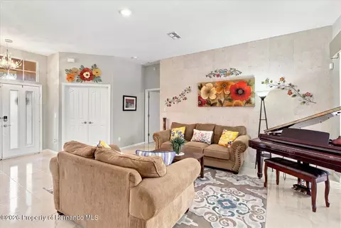 Living - 3454 St Ives Blvd, Spring Hill, FL 34609 photo 2 of 6